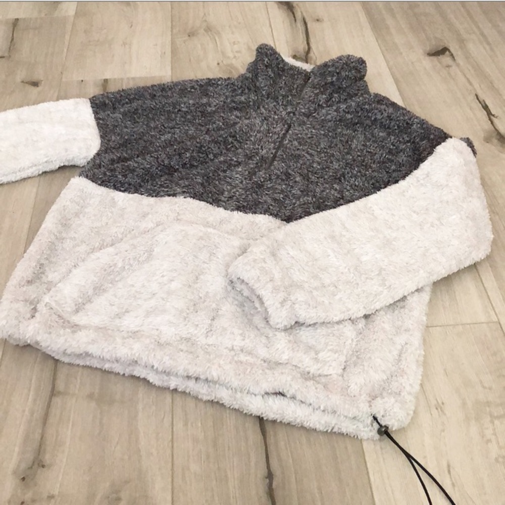 Fuzzy pullover sweater.